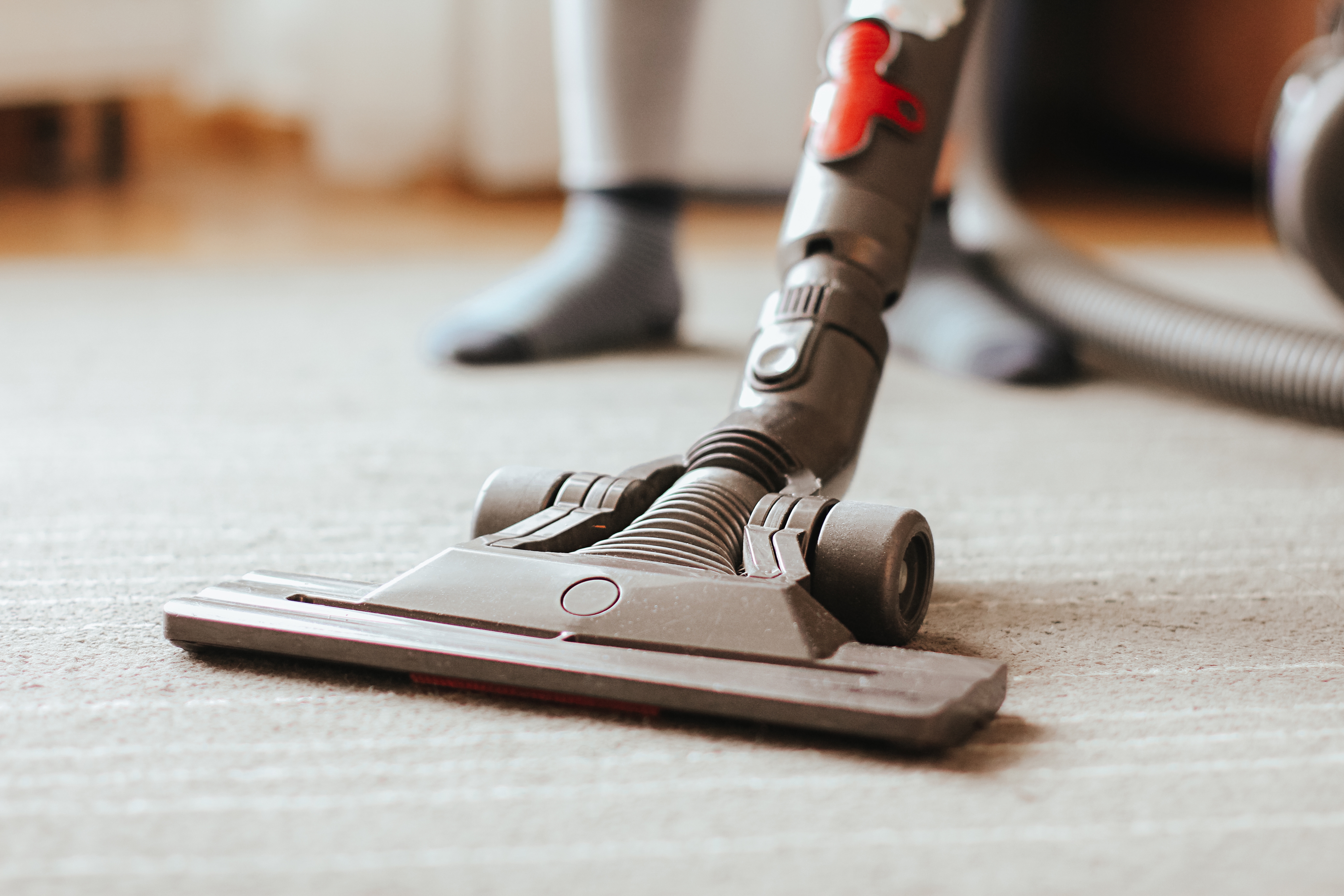 Professional using the best carpet cleaning chemicals to clean and maintain commercial carpets. 